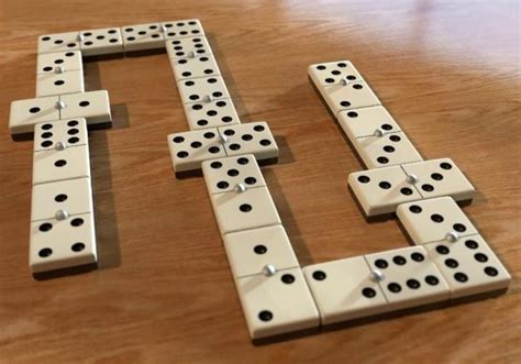 como jugar domino